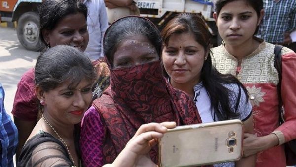 Soni Sori, political activist and victim of an acid attack, poses on International Women's Day in New Delhi.