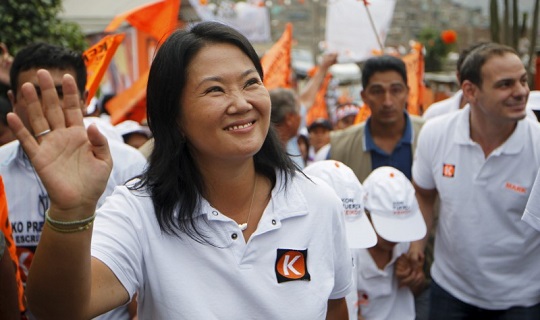 The candidate is accused of giving money away during her campaign, which is prohibited by national law.