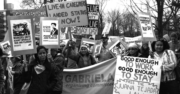 Activist demand changes to Canadian immigration policy during the May Day protest in Toronto, Canada, in 2009.