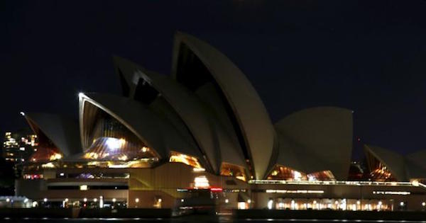 The Sydney Opera House can be seen after its lights were switched off for Earth Hour in Sydney, Australia, March 19, 2016.