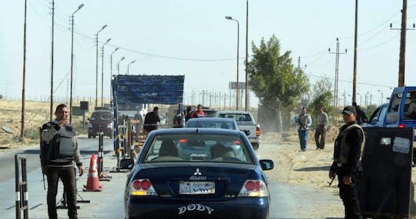 Egyptian police inspect cars at a checkpoint in North Sinai on Jan. 31, 2015