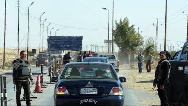 Egyptian police inspect cars at a checkpoint in North Sinai on Jan. 31, 2015 