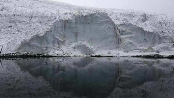 A view of the lake formed by meltwater from the Pastoruri glacier, as seen from atop the glacier in Huaraz, Sept. 19, 2013.