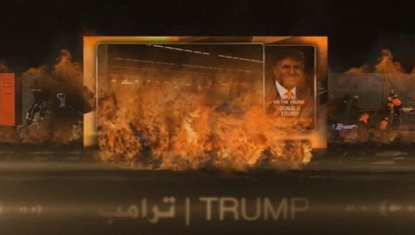 Donald Trump's photo is shown in flames in the video.