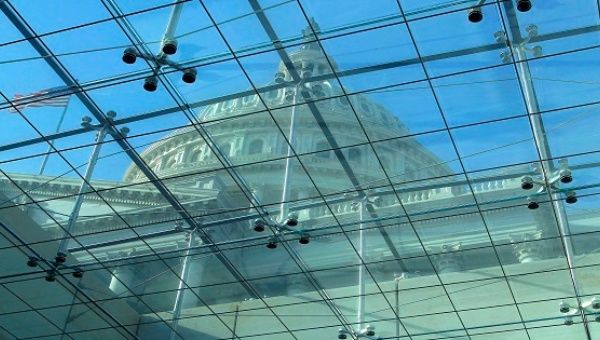 The U.S. Capitol dome is seen through skylights in the Vistor's Center in Washington, in this file photo taken January 2, 2013.