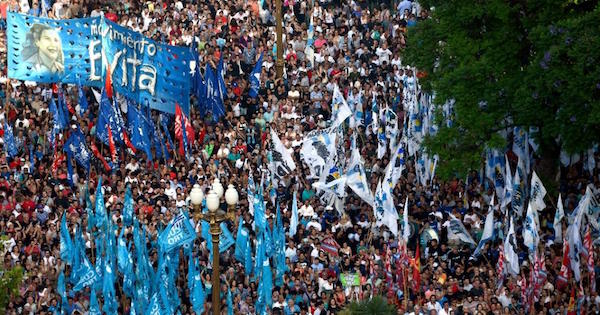 Crowds swamped the Plaza de Mayo square to protest against President Macri's bid to repeal a law that banned monopolies by media companies.