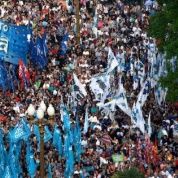 Crowds swamped the Plaza de Mayo square to protest against President Macri's bid to repeal a law that banned monopolies by media companies. 