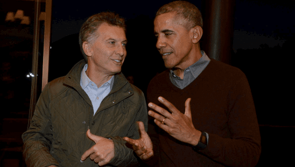 .S. President Barack Obama (R) and Argentine President Mauricio Macri speak before Obama’s departure from San Carlos de Bariloche for Buenos Aires, March 24, 2016.