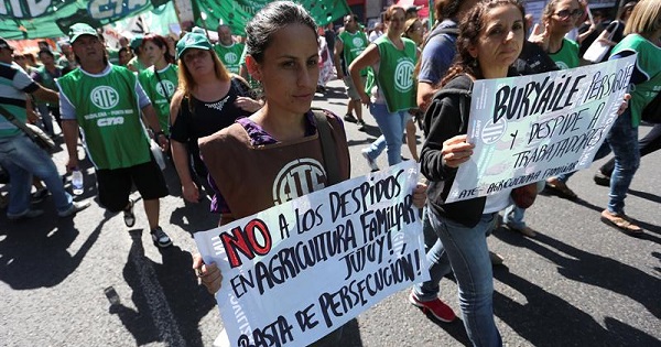 Protesters march against mass layoffs in Argentina under President Mauricio Macri, March 29, 2016.