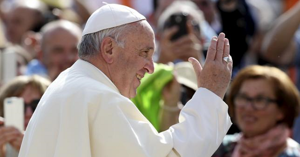 Pope Francis arrives to lead the weekly audience in Saint Peter's Square at the Vatican April 6, 2016.