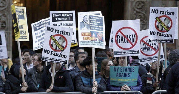 Protesters demonstrate against Republican U.S. presidential candidate Donald Trump in midtown Manhattan in New York City April 14, 2016.