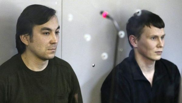 Russian troops Yevgeny Yerofeyev (L) and Alexander Alexandrov (R) at a court hearing in Ukraine, April 18, 2016.