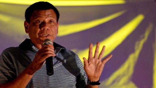 Philippine presidential front-runner candidate Rodrigo Duterte speaks during a campaign rally in Manila, on April 23, 2016.