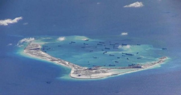 Chinese dredging vessels are purportedly seen in the waters around Mischief Reef in the disputed Spratly Islands in the South China Sea, May 21, 2015.