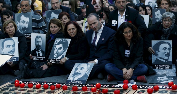 Activists hold portraits of victims during a silent demonstration near the French consulate to commemorate the mass killings of Armenians by Ottoman Turks in Istanbul.