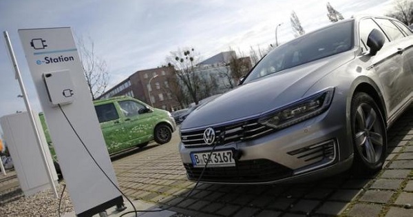 An electric Volkswagen Passat car is pictured at charging station at a VW dealer in Berlin, Germany, Feb. 2, 2016.