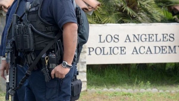 File picture shows police officers standing guard at the entrance to the Los Angeles Police Academy.