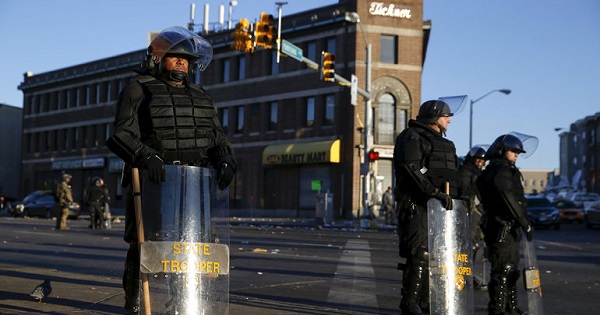 Baltimore state troopers stand guard on Pennsylvania Avenue.