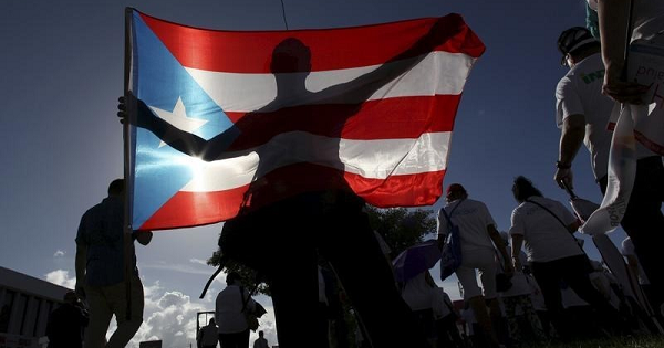 Debate is swirling in Congress over how to aide Puerto Rico, which has some $71 billion in bond debt.