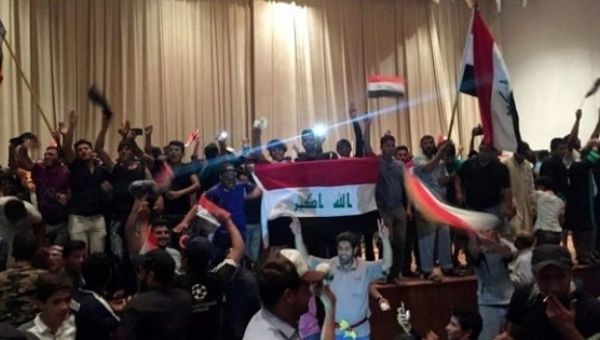 Shiite protesters stormed the Iraqi parliamentary building in Baghdad.