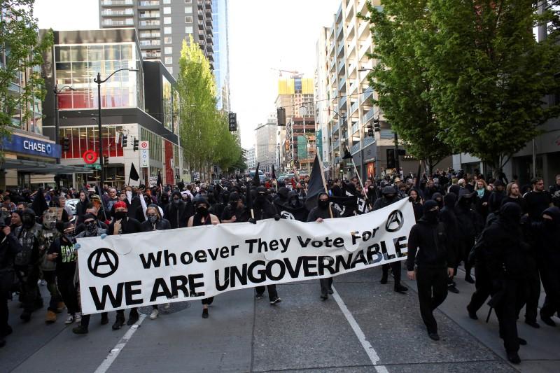 Protesters march through downtown.