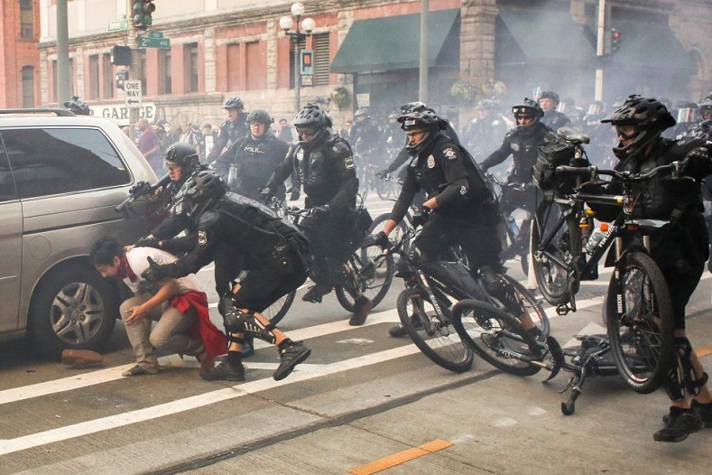 And yet another violent police arrest. In total, nine anti-capitalist protesters were detained.