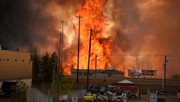 The entire city of Fort McMurray has to be evacuated because it faces imminent danger due to a huge and uncontrollable fire..