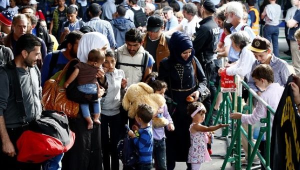 Syrian refugees arriving in Germany.