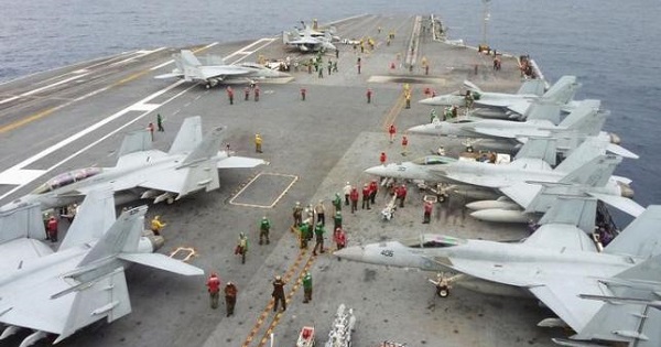 U.S fighter jets on the upper deck of the USS George Washington aircraft carrier in the South China Sea.