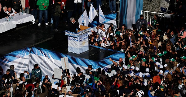 A union leader speaks to workers during a demonstration against Argentine President Mauricio Macri's policies in Buenos Aires, April 29, 2016.