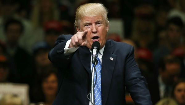 Trump gestures during a campaign event, May 26, 2016