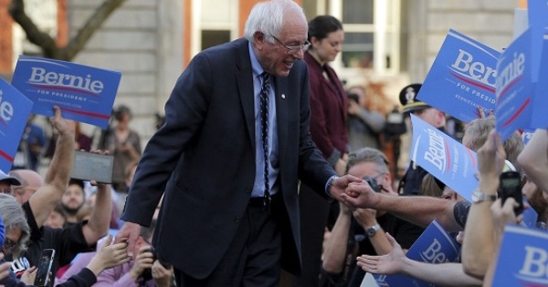 Senator Bernie Sanders greets supporters at a campaign rally outside the New Hampshire State House on Nov. 5, 2015.