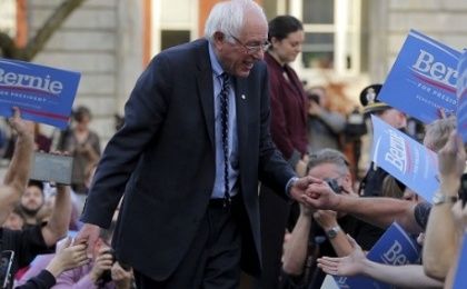  Senator Bernie Sanders greets supporters at a campaign rally outside the New Hampshire State House on Nov. 5, 2015.