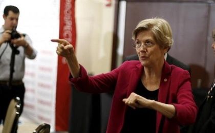 U.S. Senator Elizabeth Warren departs after her remarks at an American Prospect forum on the role of journalism in progressive politics, in Washington May 13, 2015.