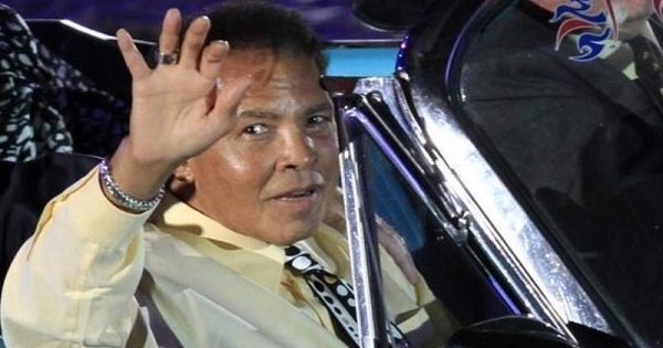 Muhammad Ali waves to the crowd during the opening ceremony of the World Equestrian Games in Lexington, Kentucky, on Sept. 2010.