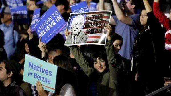 Supporters gather to see U.S. Democratic presidential candidate Bernie Sanders speak during an election night rally in Santa Monica, California, June 7, 2016. 