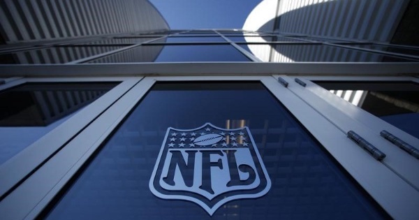 The NFL logo appears on an entrance door to the football stadium in Glendale, Arizona.