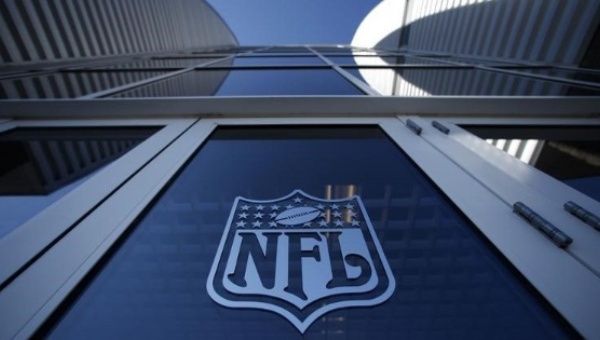 The NFL logo appears on an entrance door to the football stadium in Glendale, Arizona.