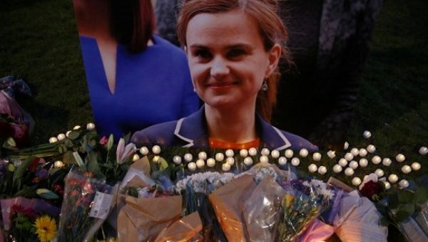 Tributes for Labour Party MP Jo Cox, who was shot dead in the street in northern England, are displayed on Parliament Square in London, Britain, June 16, 2016. 