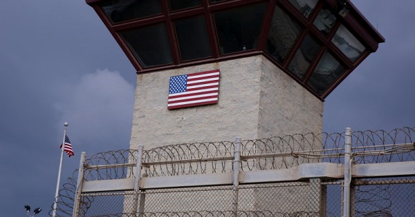 The United States flag decorates the side of a guard tower inside of Joint Task Force Guantanamo Camp VI at the U.S. Naval Base in Guantanamo Bay.