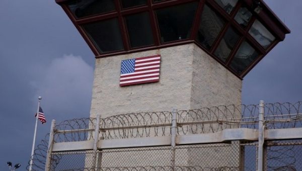 The United States flag decorates the side of a guard tower inside of Joint Task Force Guantanamo Camp VI at the U.S. Naval Base in Guantanamo Bay.