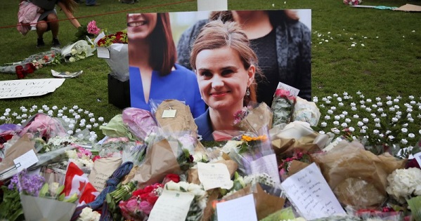 Tributes in memory of murdered Labour Party MP Jo Cox, who was shot dead in Birstall, are left at Parliament Square in London.