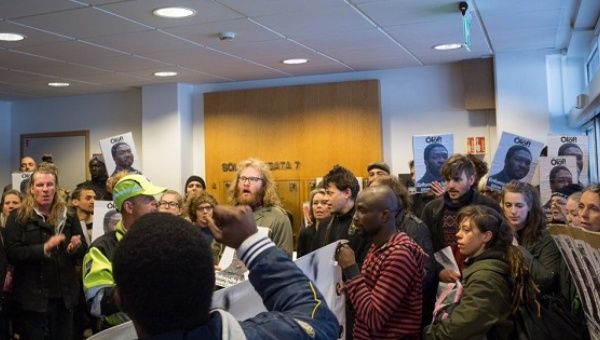 People occupy Iceland's interior ministry office to protest the deportation of Eze Okafor.