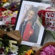 Tributes in memory of murdered Labour Party MP Jo Cox, who was shot dead in Birstall, are left at Parliament Square in London.