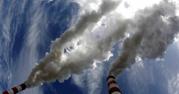 Smoke billows from the chimneys of Belchatow Power Station, Europe's biggest coal-fired power plant, in this May 7, 2009 file photo.