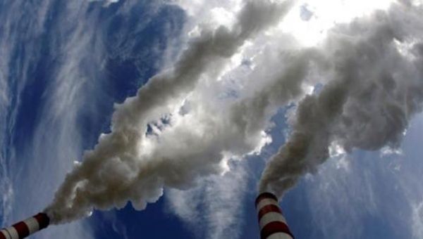 Smoke billows from the chimneys of Belchatow Power Station, Europe's biggest coal-fired power plant, in this May 7, 2009 file photo.