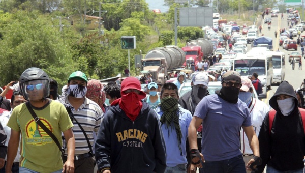 Members of the teacher's union CNTE block access to the petrol storage and distribution facility of Mexican state-owned oil company Pemex in Oaxaca, Mexico.