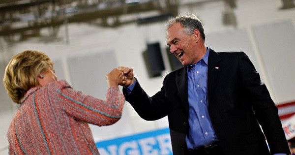 Democratic U.S. presidential candidate Hillary Clinton and Senator Tim Kaine react during a campaign rally in Annandale, Virginia, July 14, 2016.