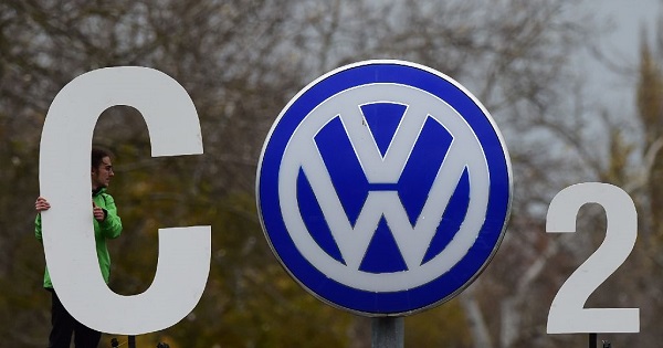 A Greenpeace activist with a CO2 sign at Volkswagen's headquarters in Wolfsburg, Germany, Nov. 9, 2015.