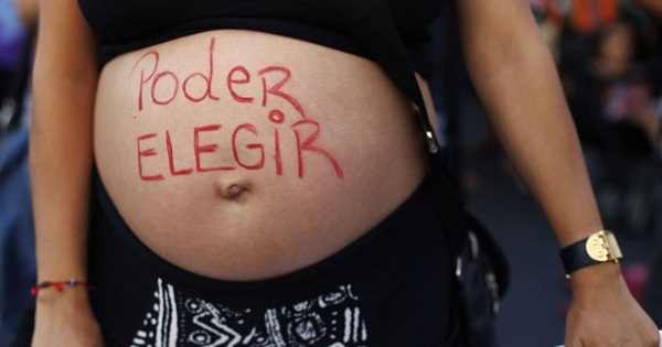 A woman protests for the right to choose.